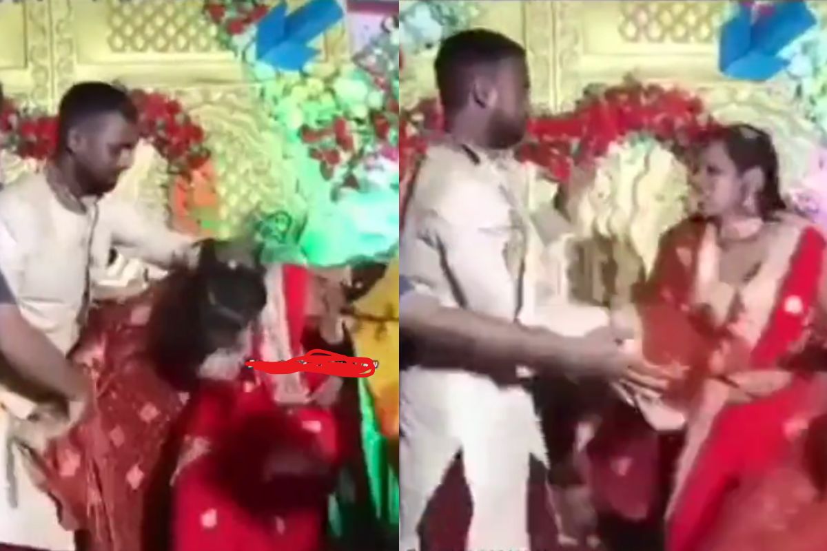 Bride and groom war on wedding stage
