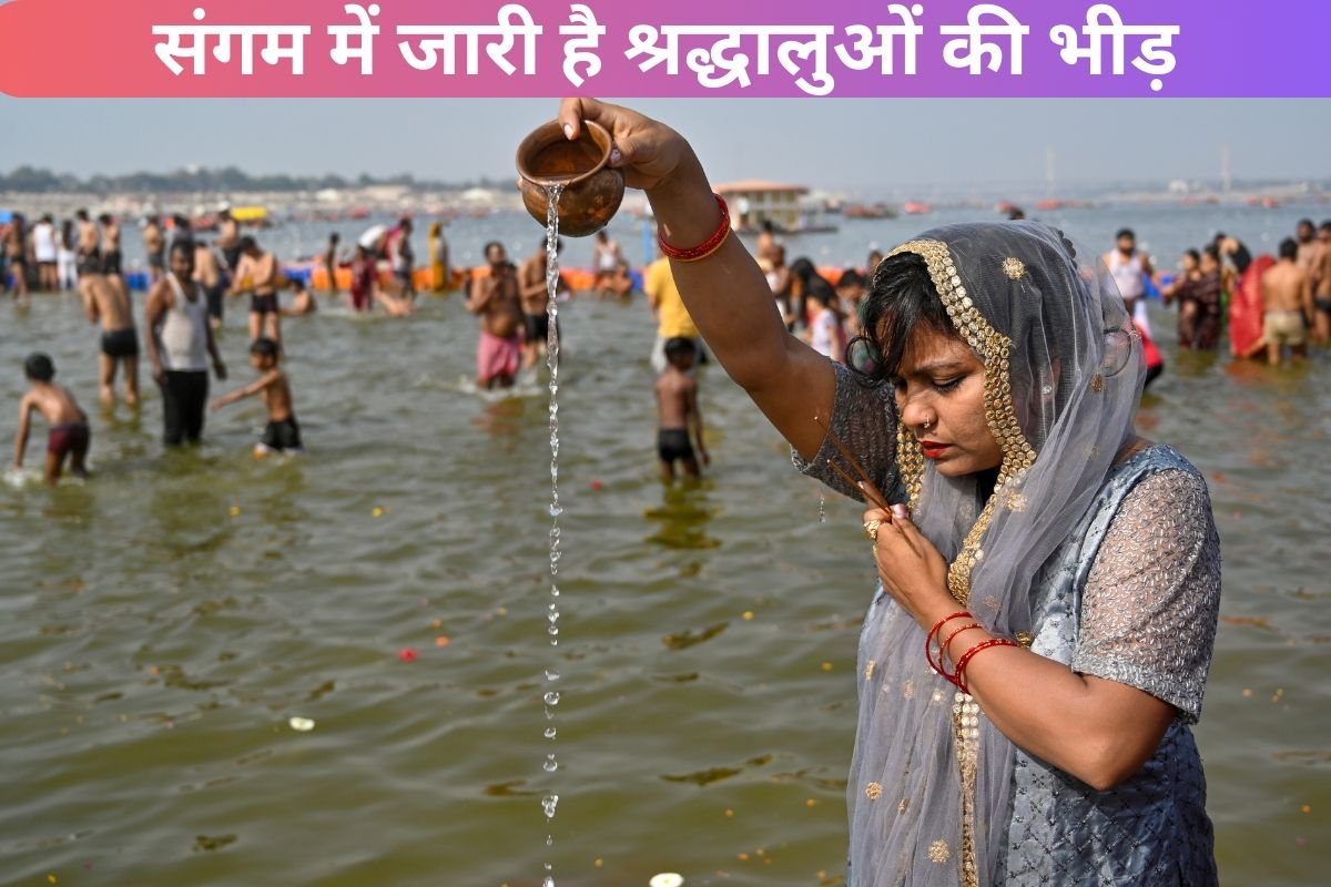 devotee performs rituals at the Sangam area