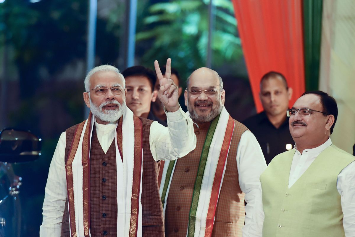 पीएम मोदी, गृहमंत्री अमित शाह और बीजेपी अध्यक्ष जेपी नड्डा की फाइल फोटो