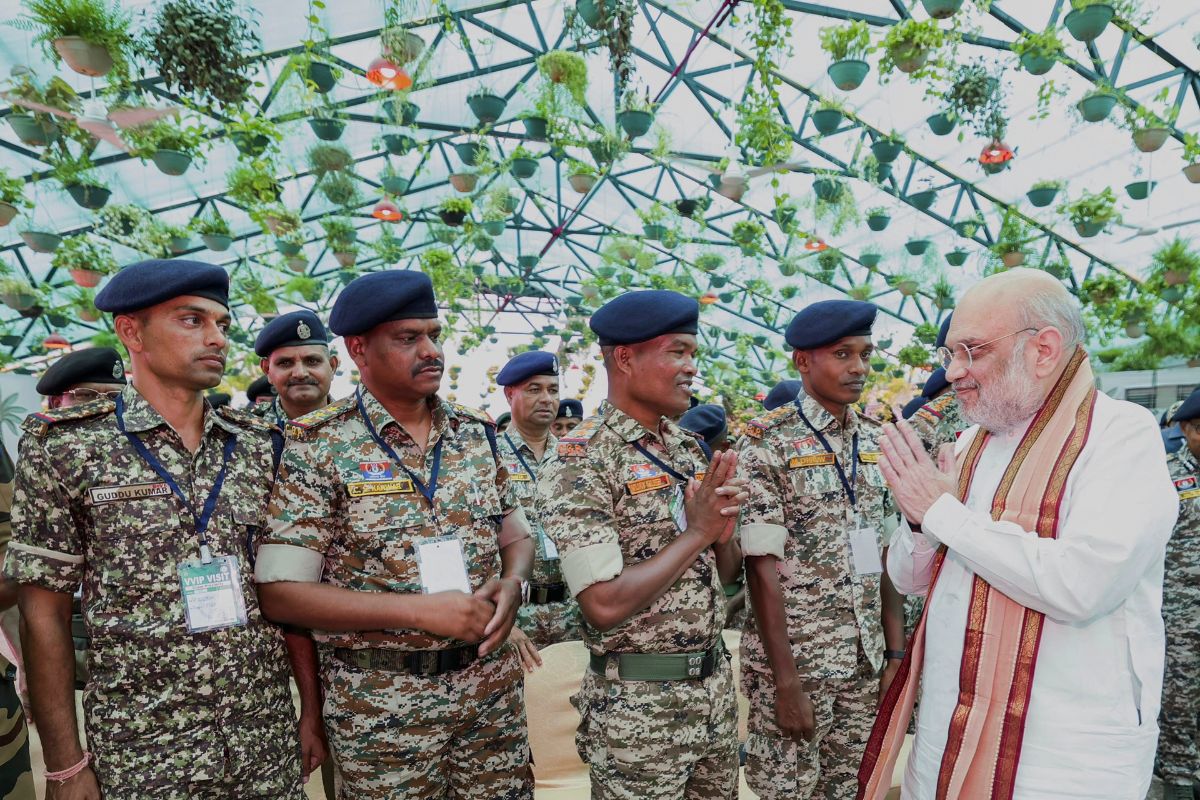 Amit Shah interacts with security personnel