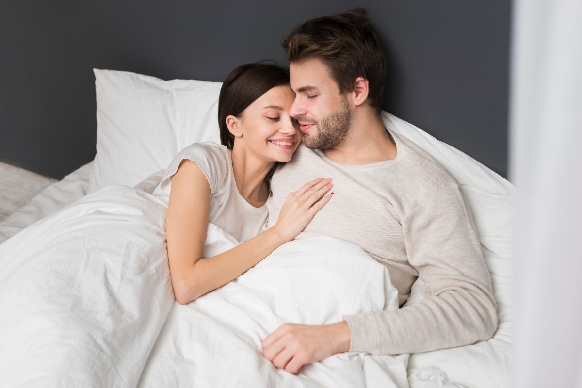 Man in bed with wife