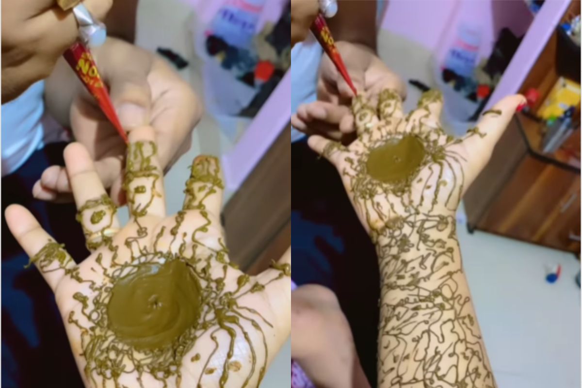 Viral Video Husband Make Mehndi on Wife Hand