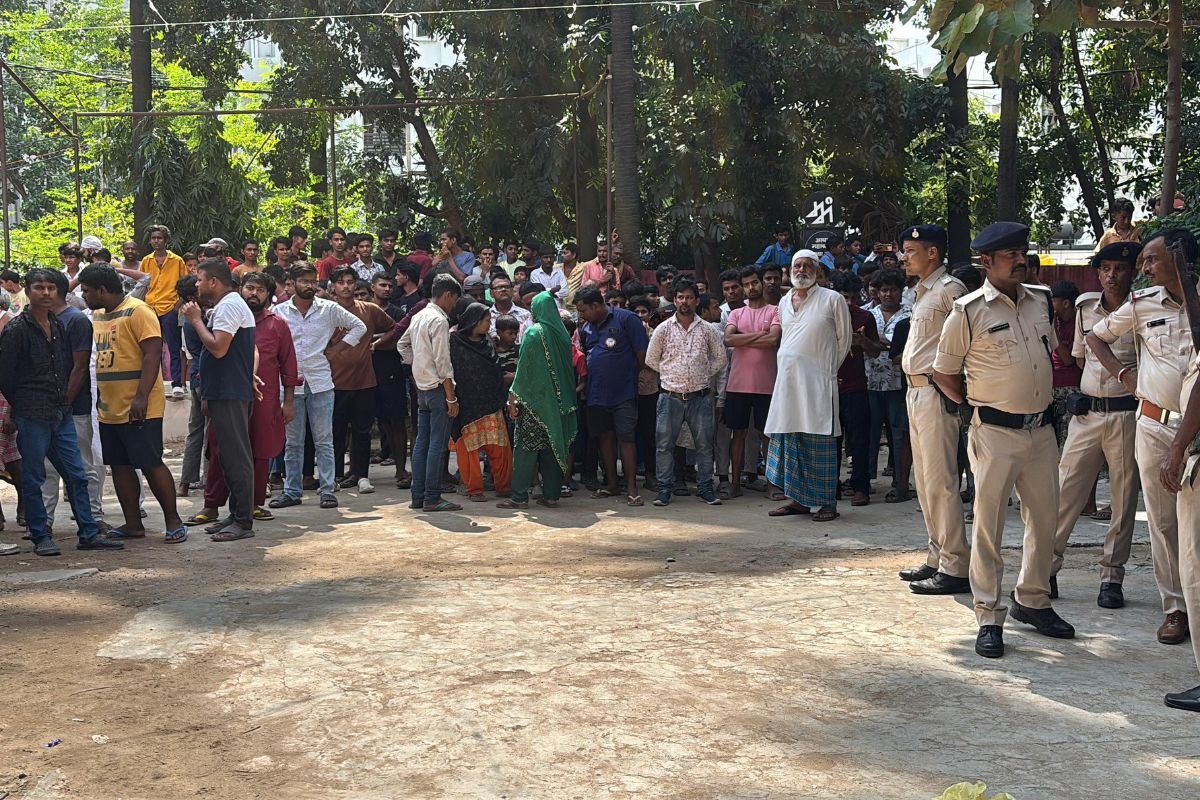 Crowd of people outside the school