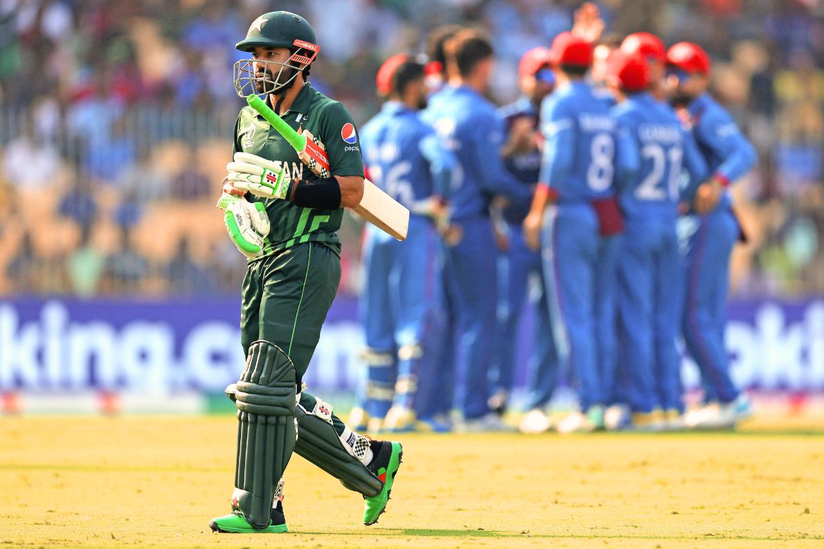 Mohammad Rizwan walks back to the pavilion after being dismissed