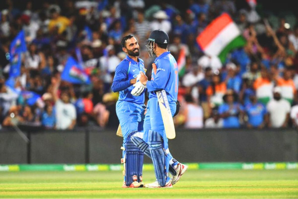 Dinesh Karthik and MS Dhoni During Match