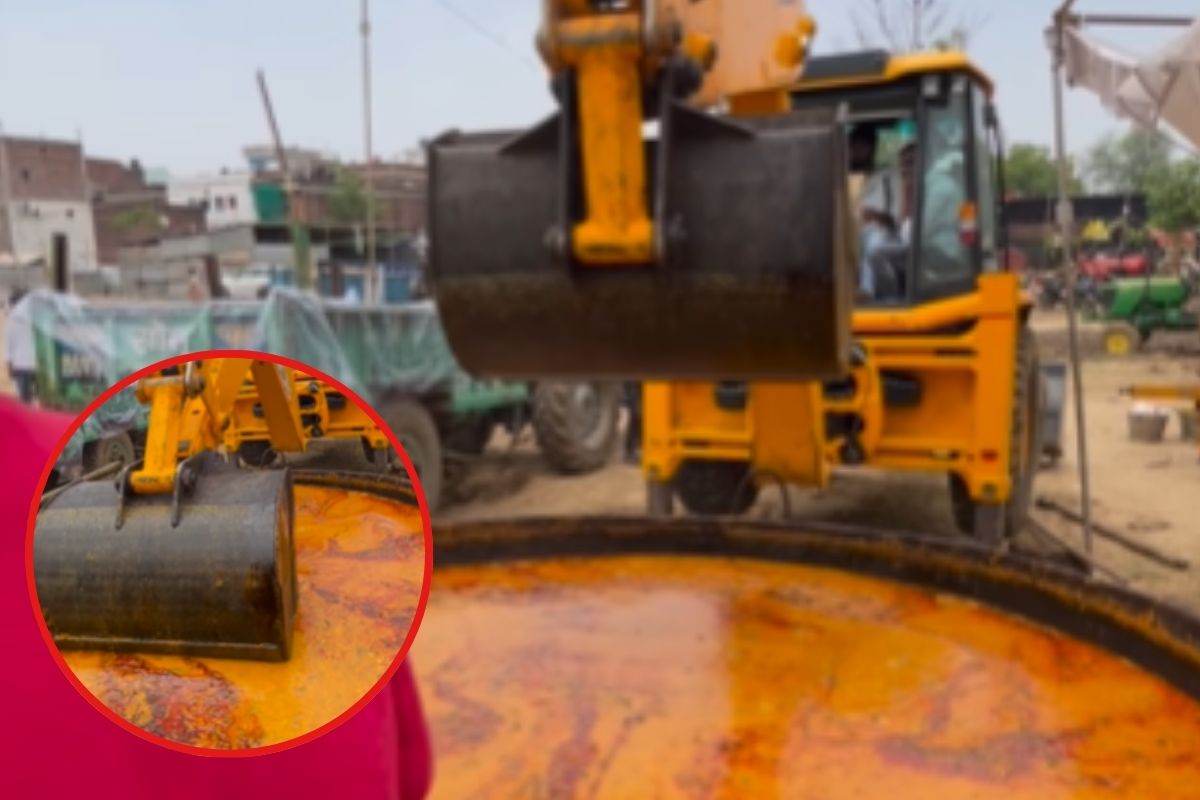 JCB being used For Cooking Dal