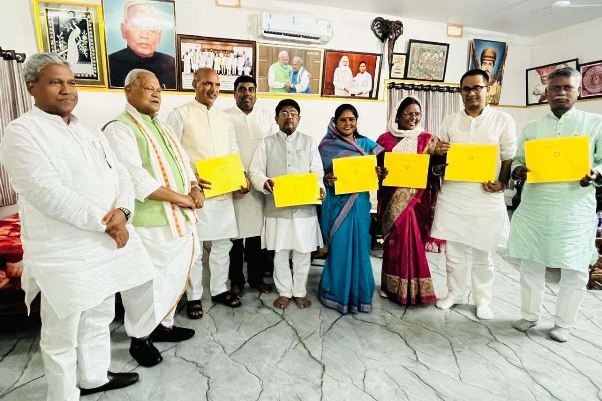 Union Minister Jitan Ram Manjhi giving party symbol to HAM candidates