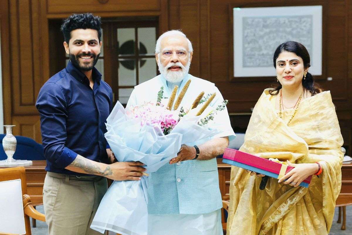 Rivaba Jadeja and Rivaba Jadeja with PM Modi
