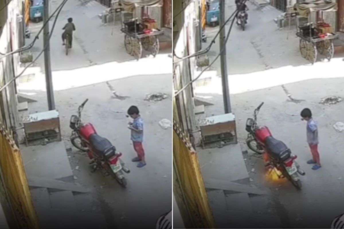 viral video boy sets parked bike on fire