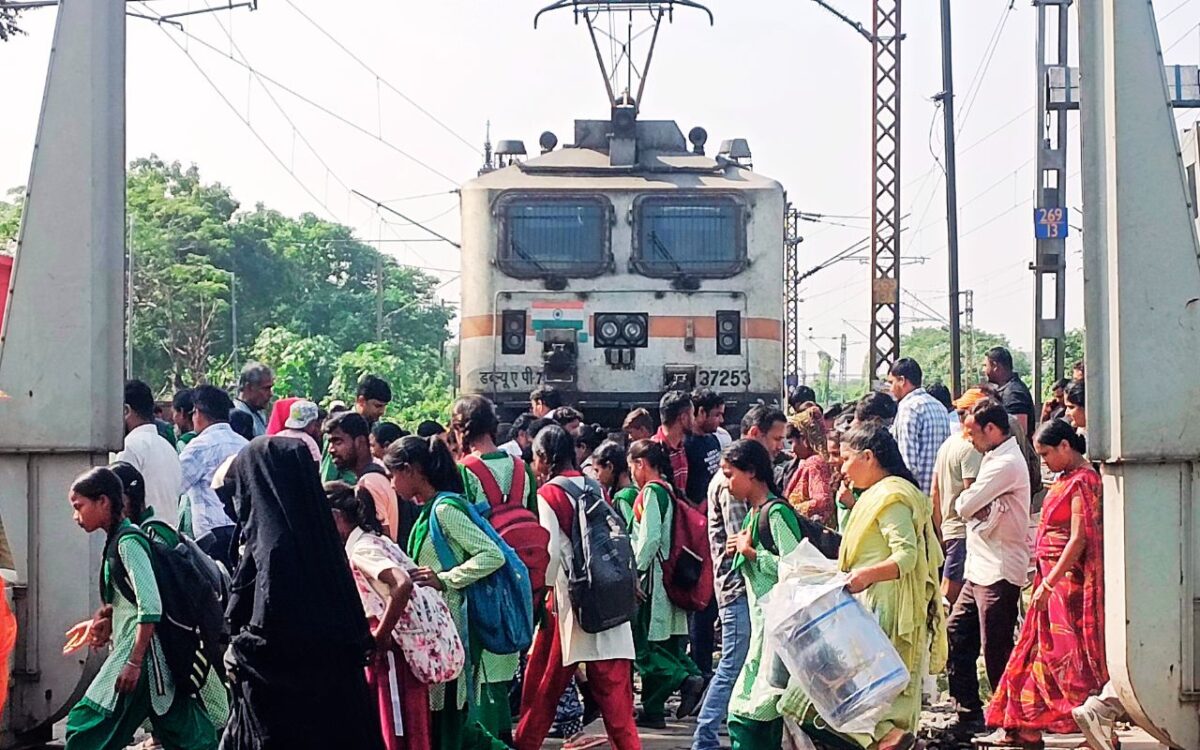 People Crossing Railway Track
