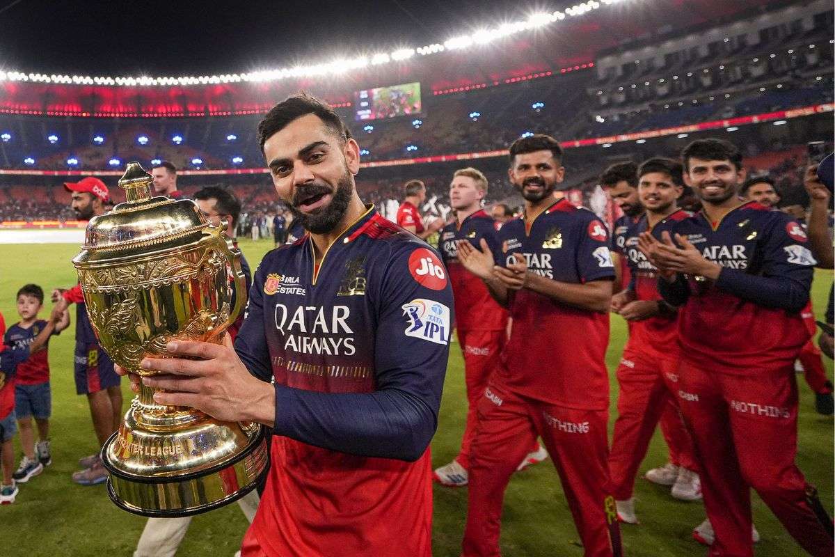 RCB Players with IPL 2025 Trophy