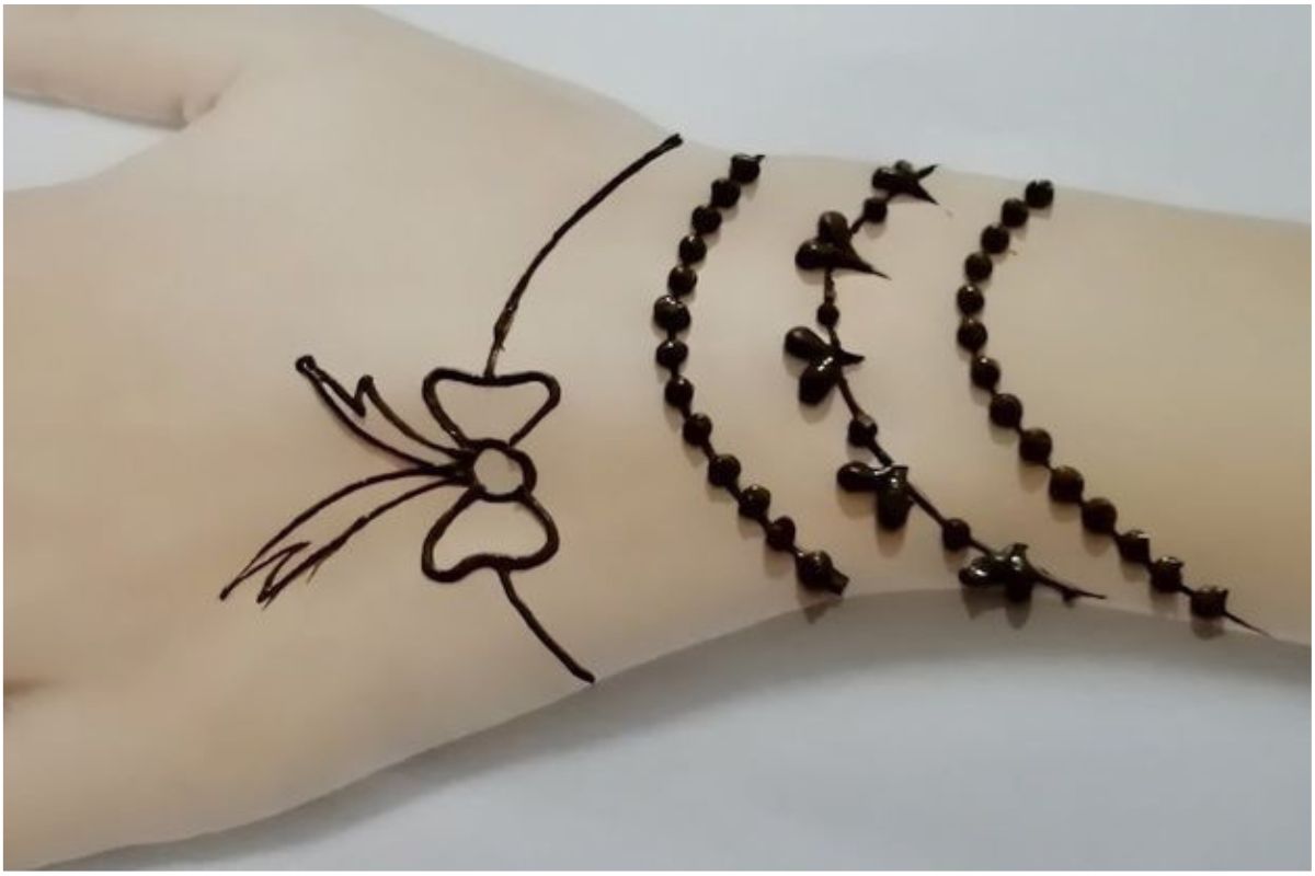 New Year Special Mehndi Design 2026: पार्टी लुक के लिए 5 मिनट में बनाएं ये 5 ट्रेंडी और ग्लॉसी मेहंदी डिजाइन 7 Bracelet Cum Cuff Design