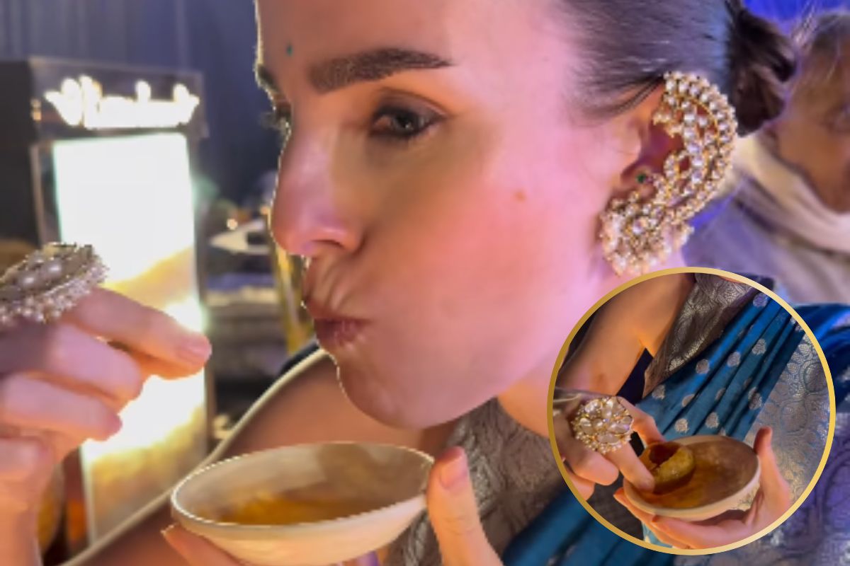 Foreign girl eating Golgappa