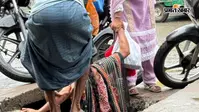नौबतपुर बाजार में खुला चैंबर बना खतरा, महिला नाले में गिरी; लोगों ने बचाई जान